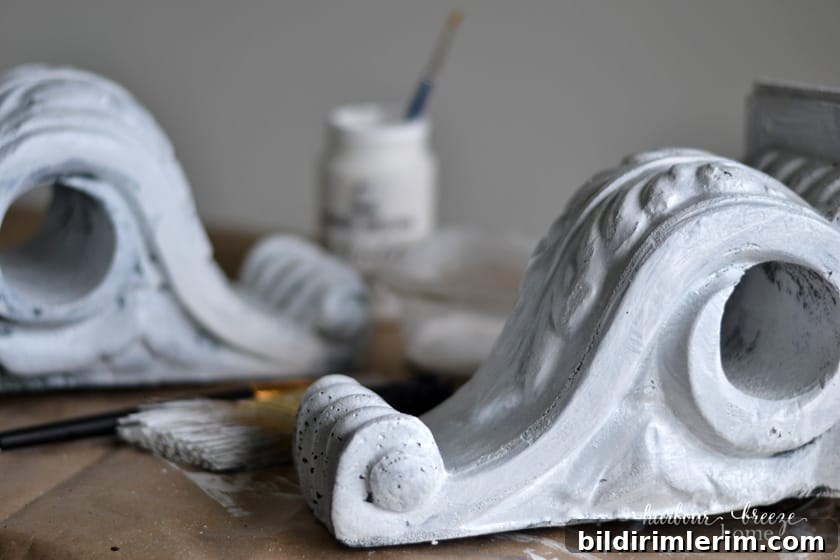 How to Make Farmhouse-Style Painted Foam Corbels 6 Foam corbels with one coat of paint on them