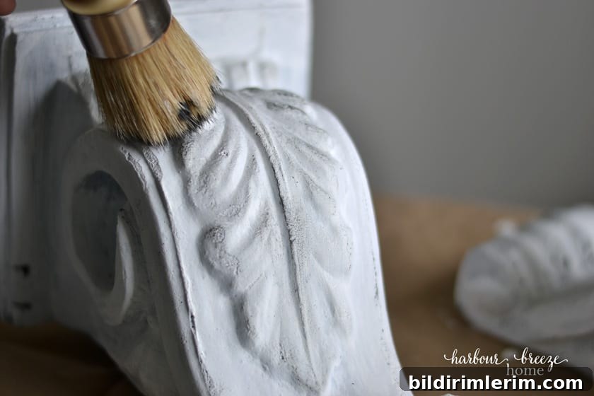 How to Make Farmhouse-Style Painted Foam Corbels 7 Drybrushing gray paint onto a white painted corbel