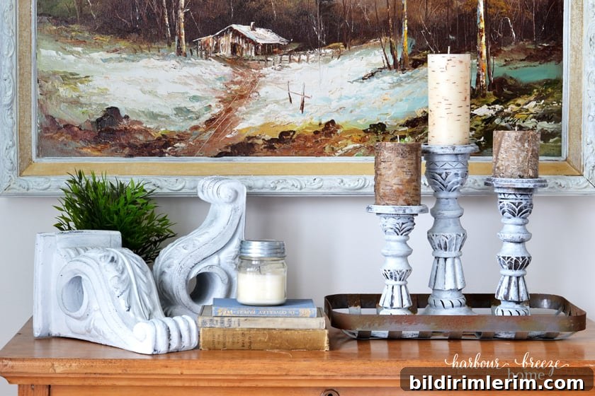 How to Make Farmhouse-Style Painted Foam Corbels 9 Farmhouse Style corbels on a table top with candles and vintage books