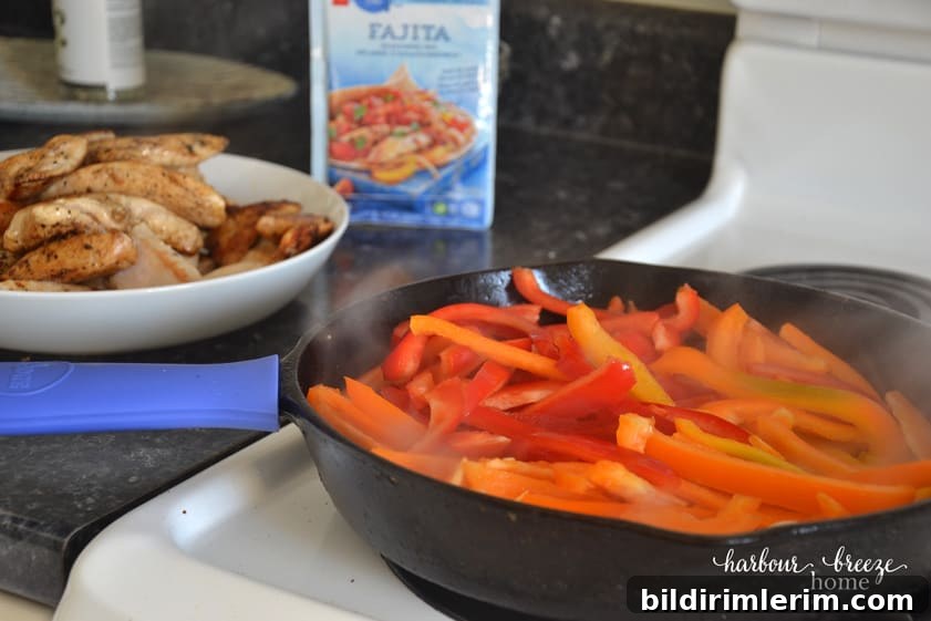Peppers and onions sautéing