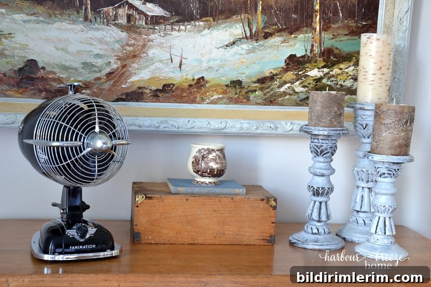 how do I style a fan on a master bedroom dresser top?