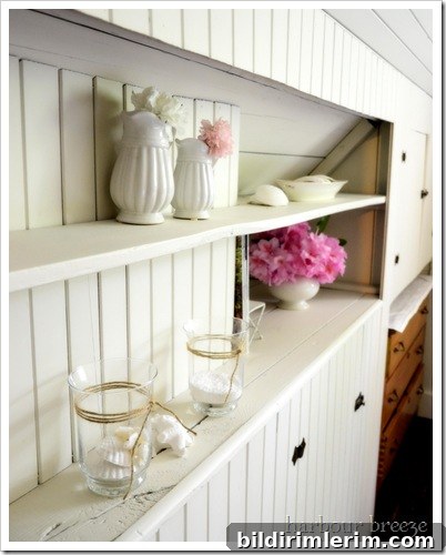 shelves styled with cottage decor