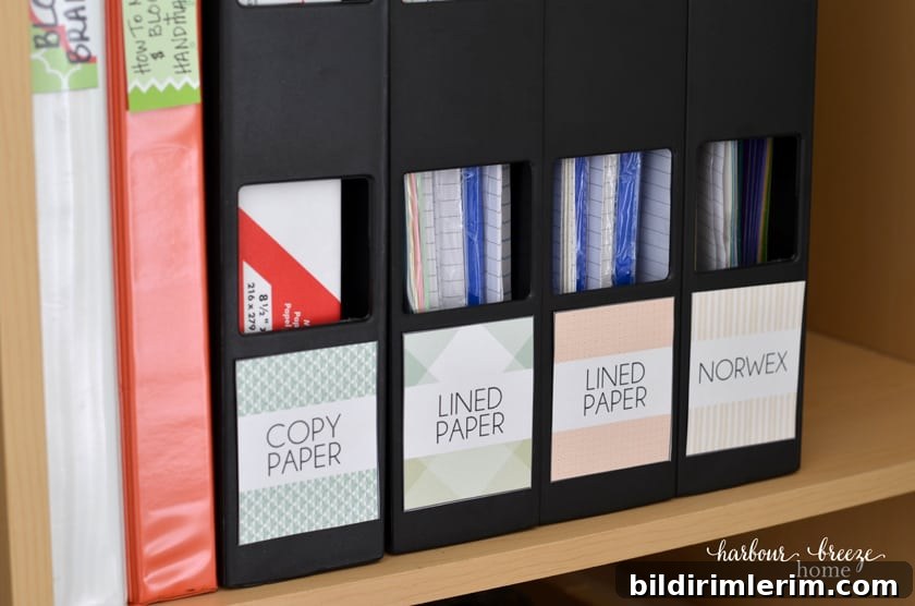 7 Clever Paper Storage Ideas to Declutter Your Home 6 Magazine holders with paper stored in them with labels on each one.