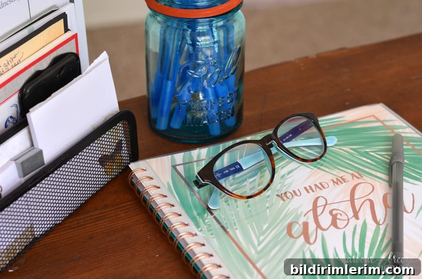 7 Clever Paper Storage Ideas to Declutter Your Home 8 A desktop day-planner sitting on a desk.