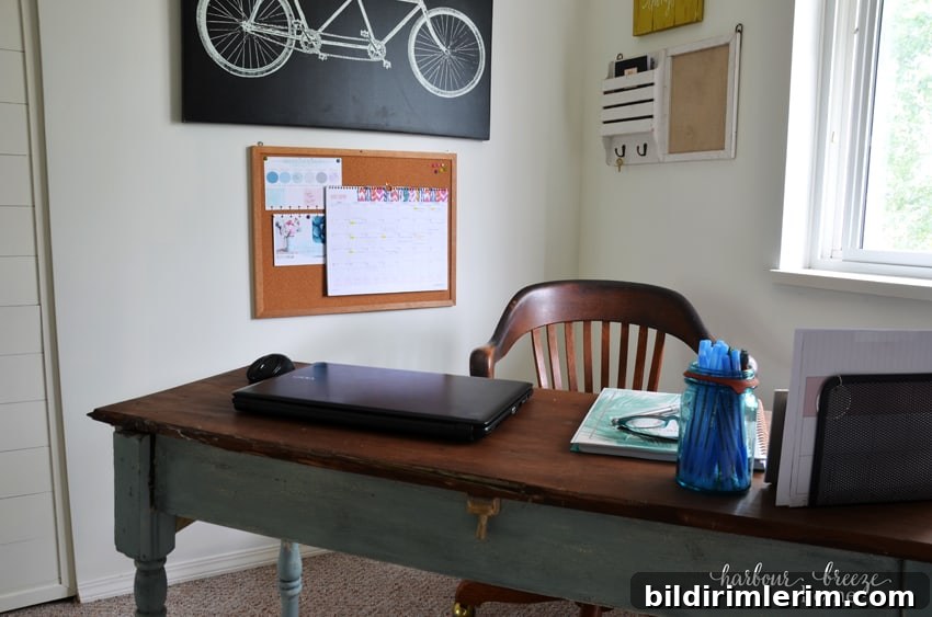 7 Clever Paper Storage Ideas to Declutter Your Home 9 A bulletin board hanging above a desk with papers hung on it.