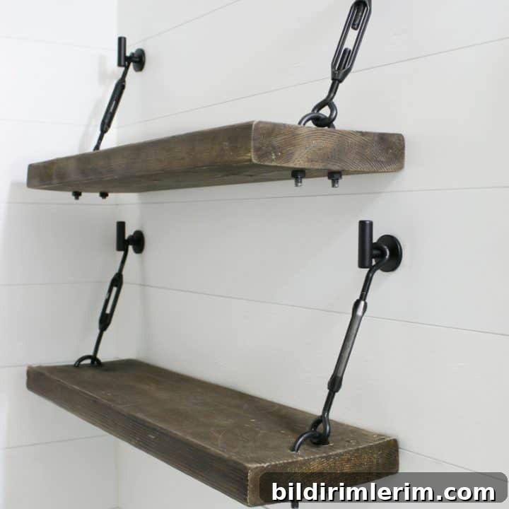 Turnbuckle shelves installed above the toilet for towel storage