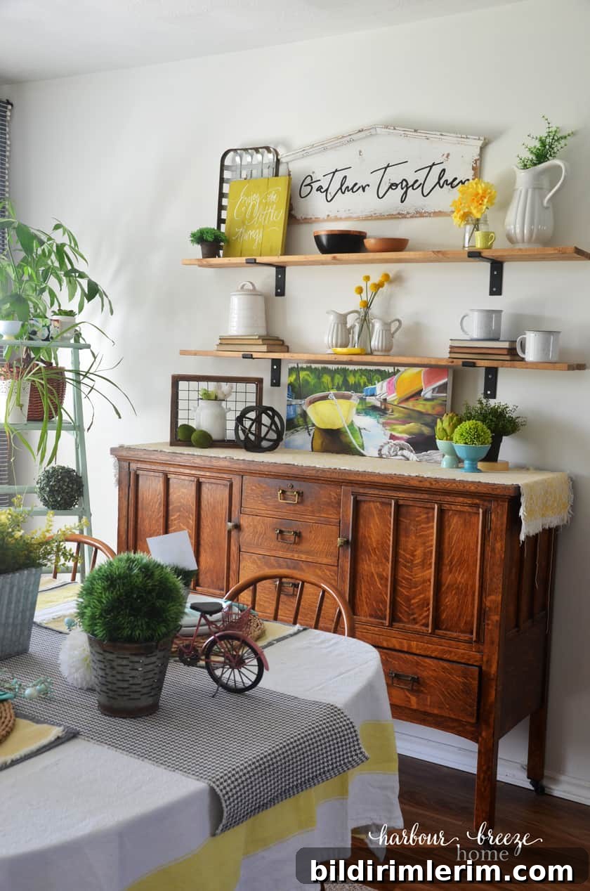 Green plants and faux florals in dining room