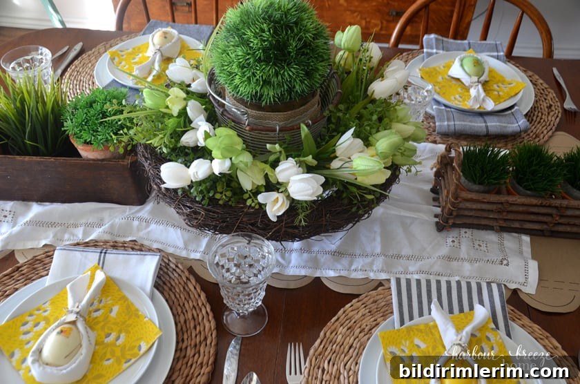 A view from the top of an Easter tablescape featuring bunny ear napkins sitting on yellow floral napkins on the top of white plates.