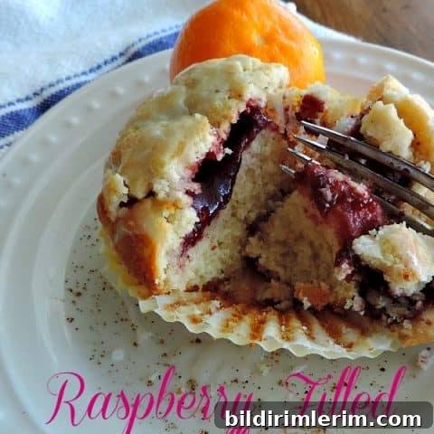 39 Berry Recipes to Make All Year 14 Raspberry Filled Muffins