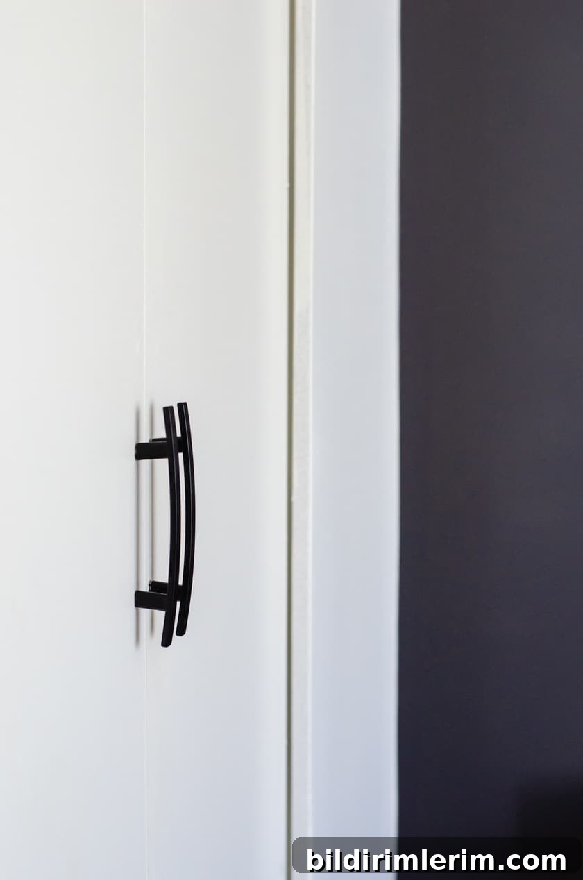 Modernize Your Bedroom with Sleek New Door Knobs 7 Close up of 2 modern door pulls on bi-fold closet door