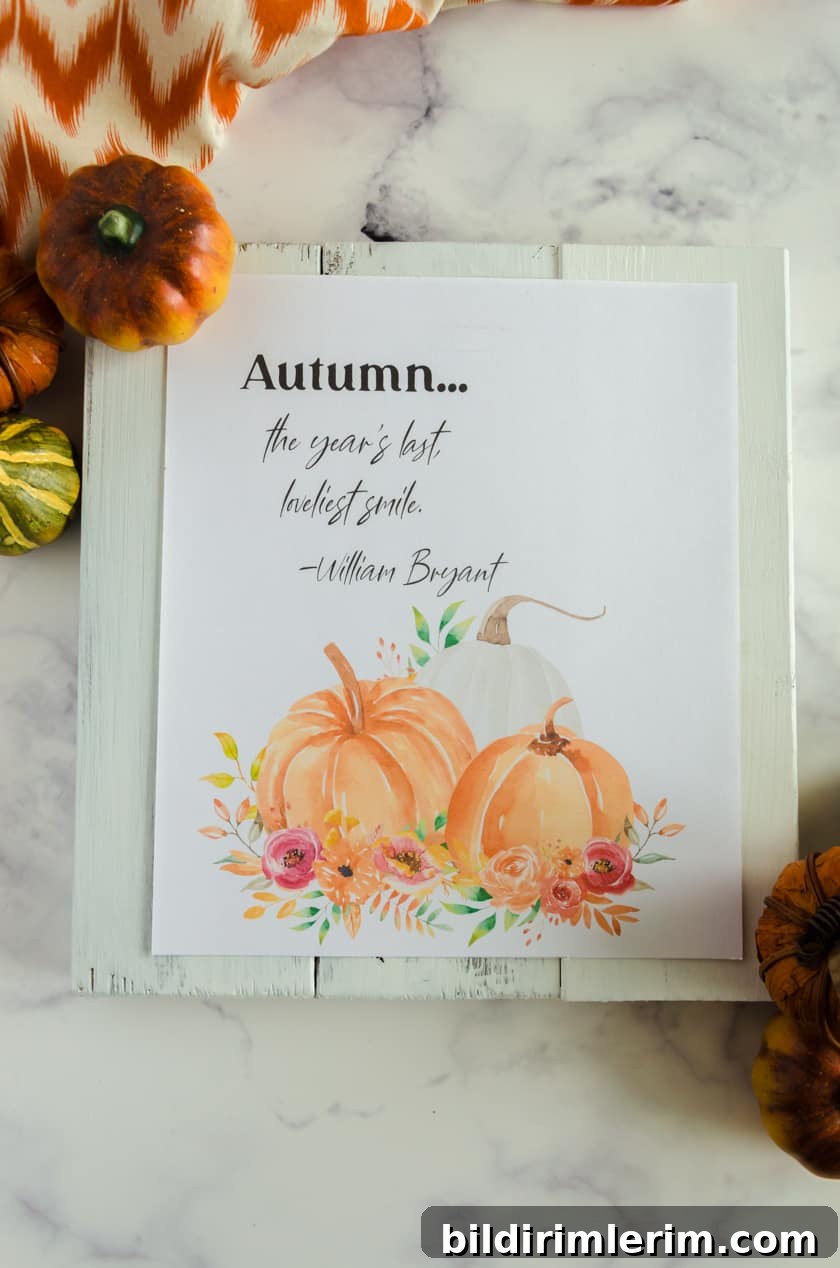 Fall art printable with watercolor pumpkins and the saying 
