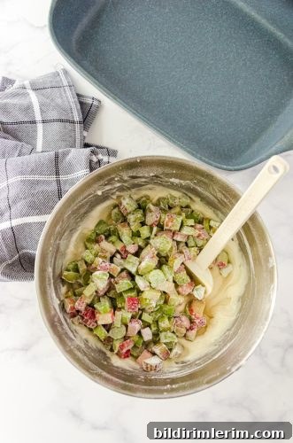 Rhubarb that has been added to cake batter for rhubarb coffee cake