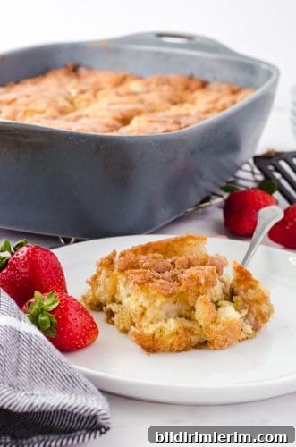 A piece of rhubarb cake on a dessert plate.