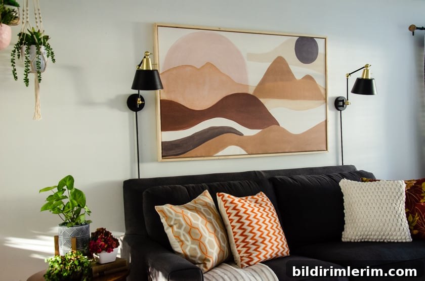 Canvas with floating frame hung above a couch