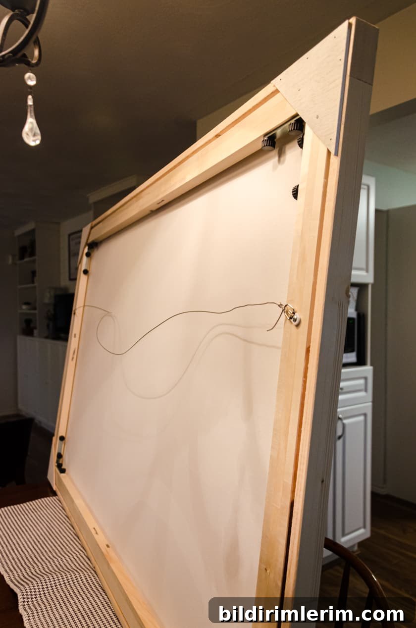 Back of a large canvas with a floating frame attached