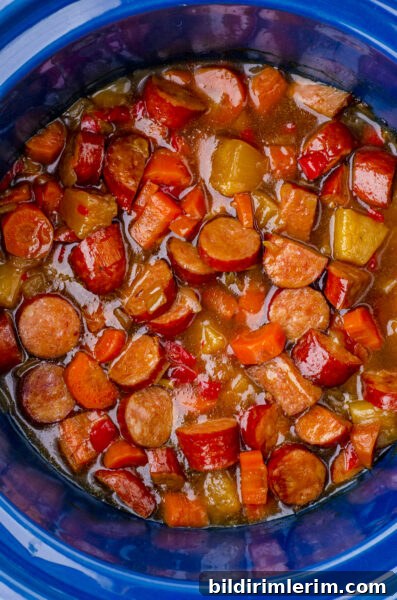 Sweet and sour crock pot sausage and peppers recipe in a crock pot