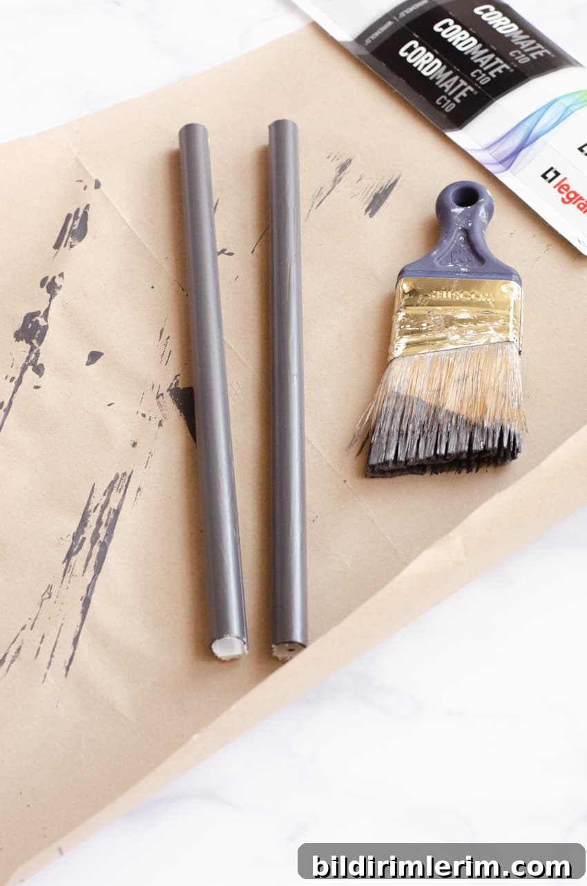 Wall lamp cord covers painted with the matching wall color.