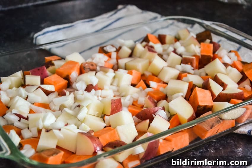 Chopped vegetables in a pan before roasting