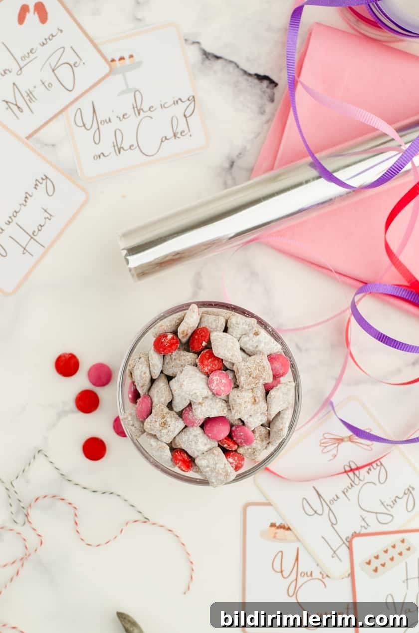 A bowl of Valentines puppy chow mix with a stack of free valentines tags beside it