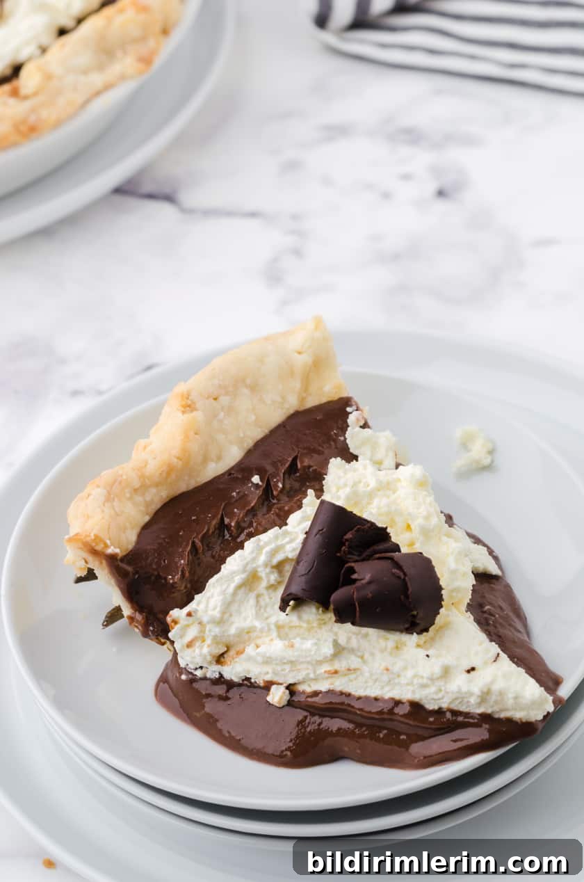 A slice of chocolate pudding pie that looks a bit like molten chocolate pie!
