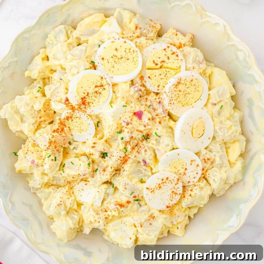 bowl of potato salad with egg and miracle whip