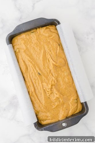 Moist Pumpkin Bread Made with Yellow Cake Mix 8 Pumpkin bread batter in a loaf pan