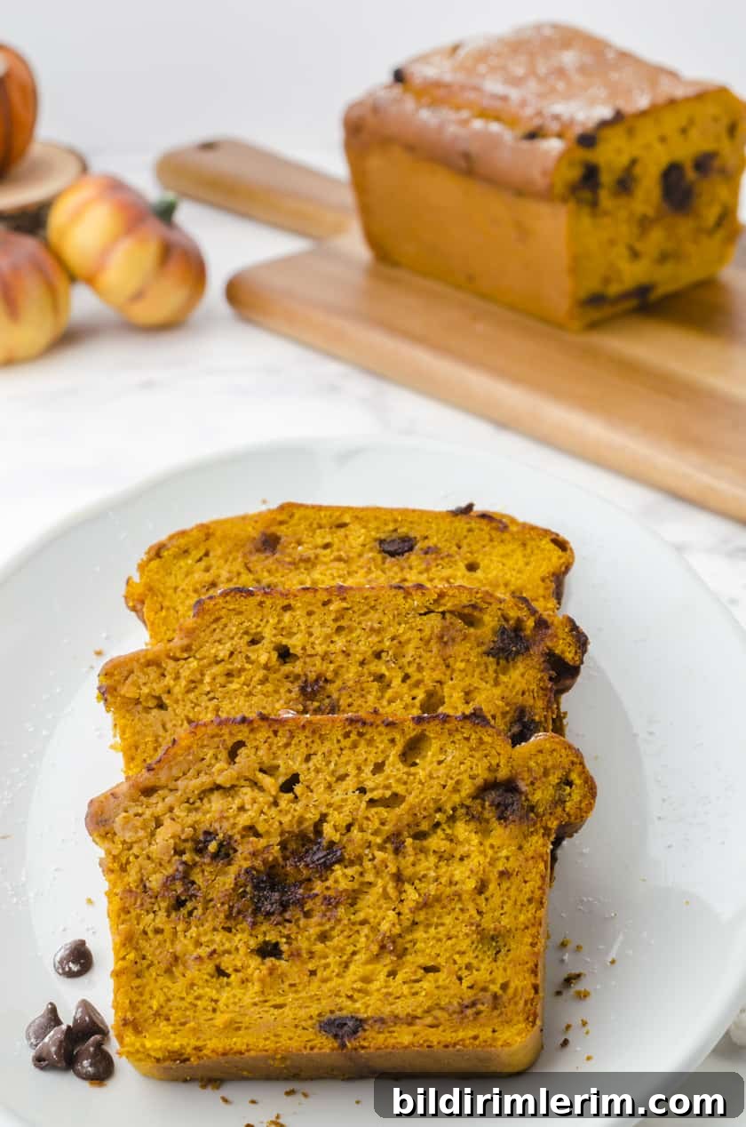 Moist Pumpkin Bread Made with Yellow Cake Mix 10 Sliced chocolate chip pumpkin bread on a platter
