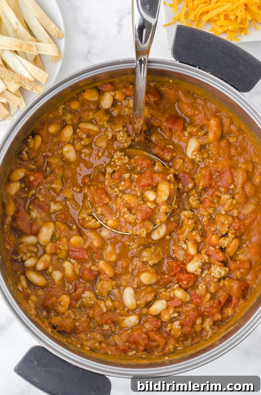 Turkey pumpkin chili in a soup pot.