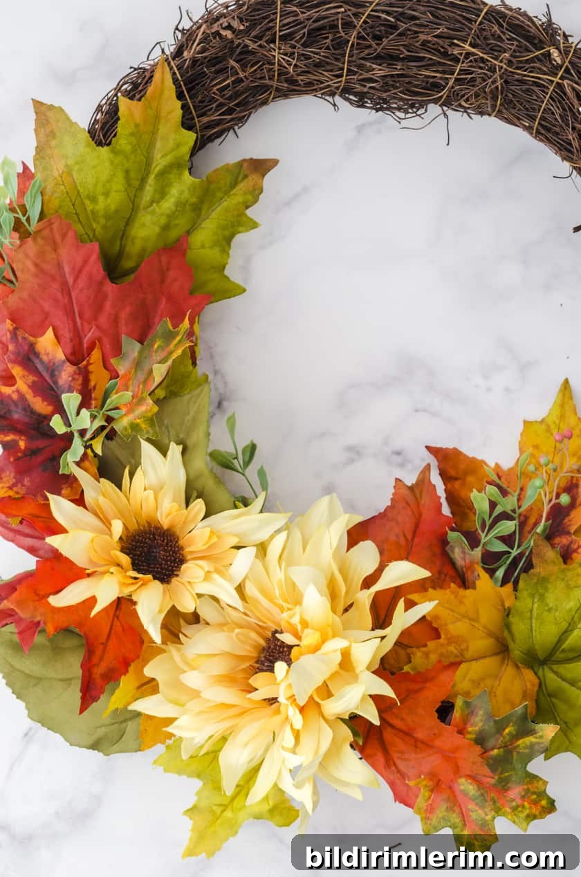 close up of the fake flowers on a fall wreath