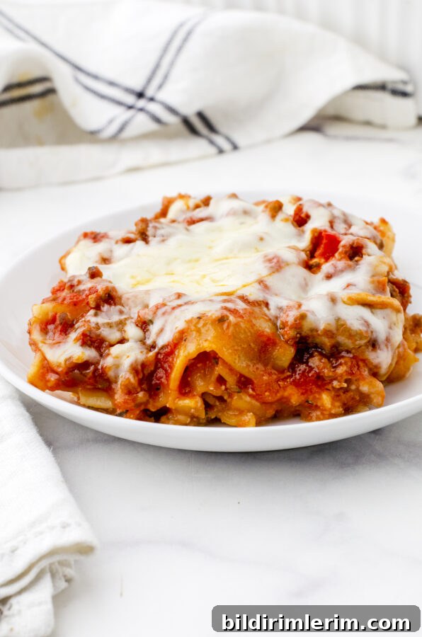 Baked make ahead lasagna on a dinner plate.