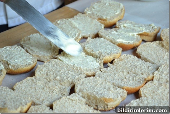 Ham and Cheese Sliders Recipe for 65 Guests 4 spreading mayonnaise on buns for ham and cheese sliders