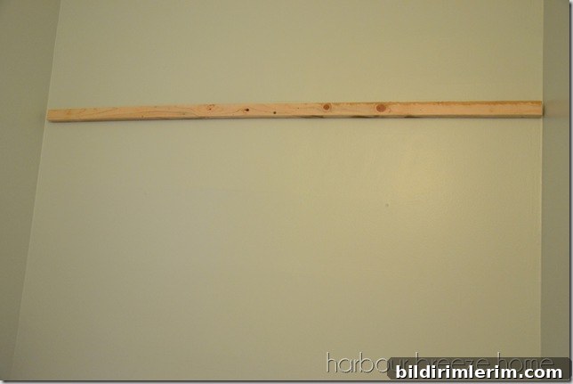 attach bottom piece to wall the bottom of a french cleat attached to a wall