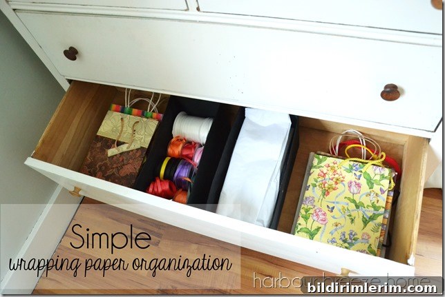 Simple wrapping paper organization: rolls of paper stored neatly