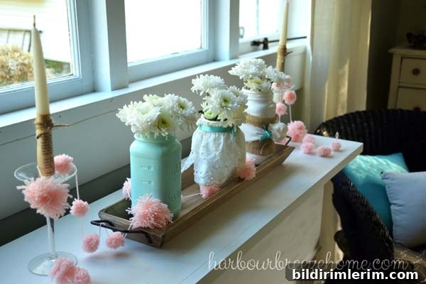 DIY Flower Arrangements Using Grocery Store Blooms 4 A set of 3 mason jars with white carnations in them