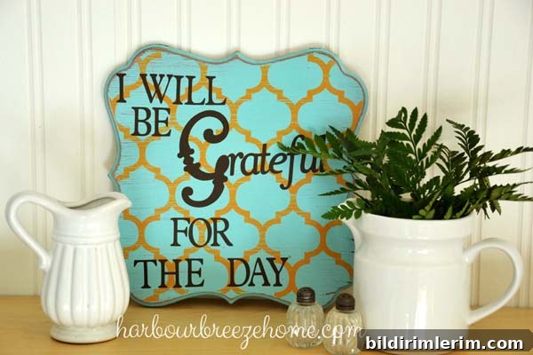 DIY Flower Arrangements Using Grocery Store Blooms 6 Fern leaves in a pitcher on a shelf