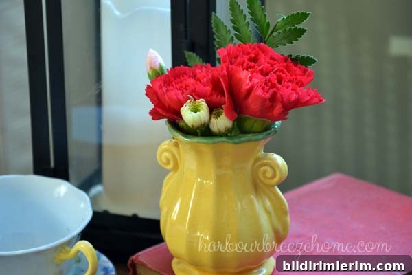 DIY Flower Arrangements Using Grocery Store Blooms 9 Red carnations in a yellow vase