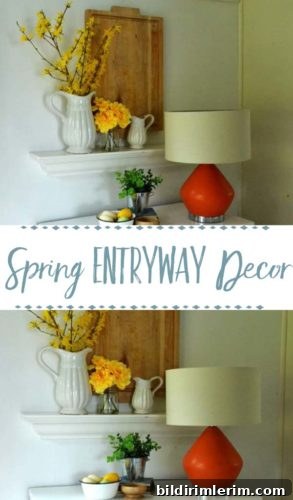 SPRING ENTRYWAY VIGNETTE|Yellow flowers, a wooden cutting board, white pitchers, a bright lamp and greenery make a simple and happy Spring Entryway Vignette. spring entryway decor