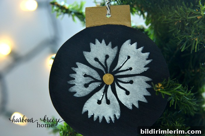 Be inspired by these creative options for handmade wooden ornaments at harbourbreezehome.com.