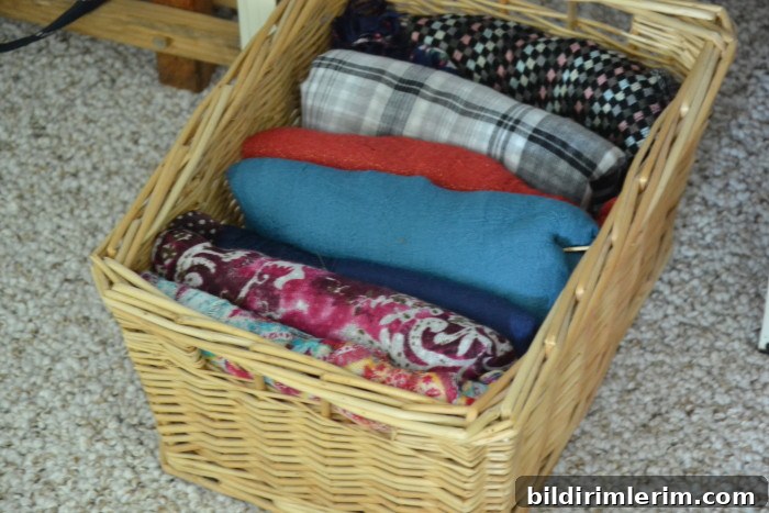 Scarves folded neatly in a basket.