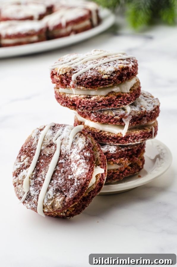 Red Velvet Crinkle Whoopie Pie cookies stacked up.
