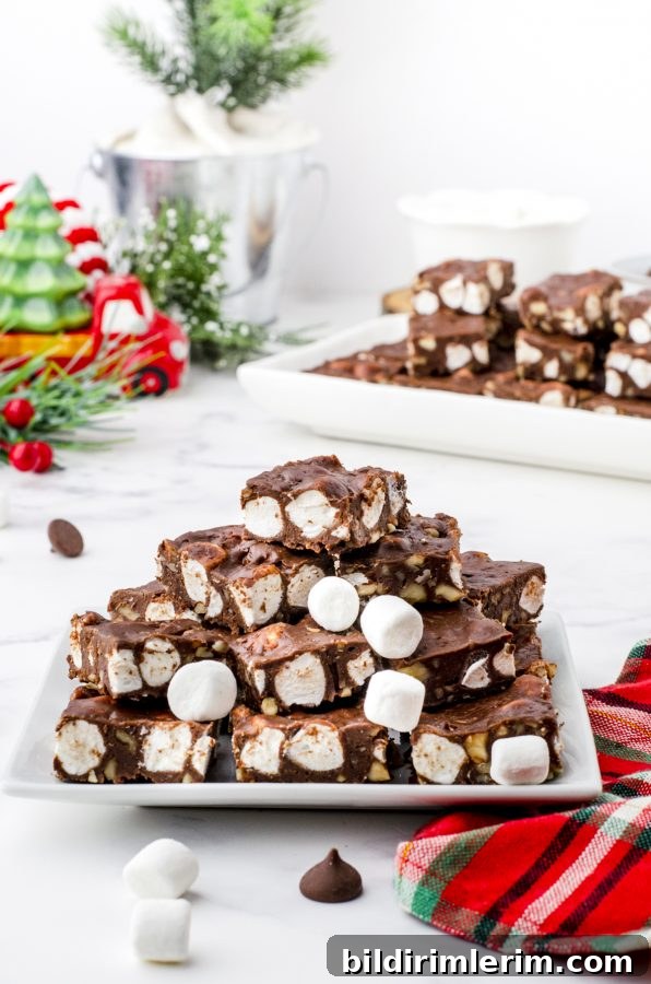 5 minute fudge with sweetened condensed milk piled on a white plate