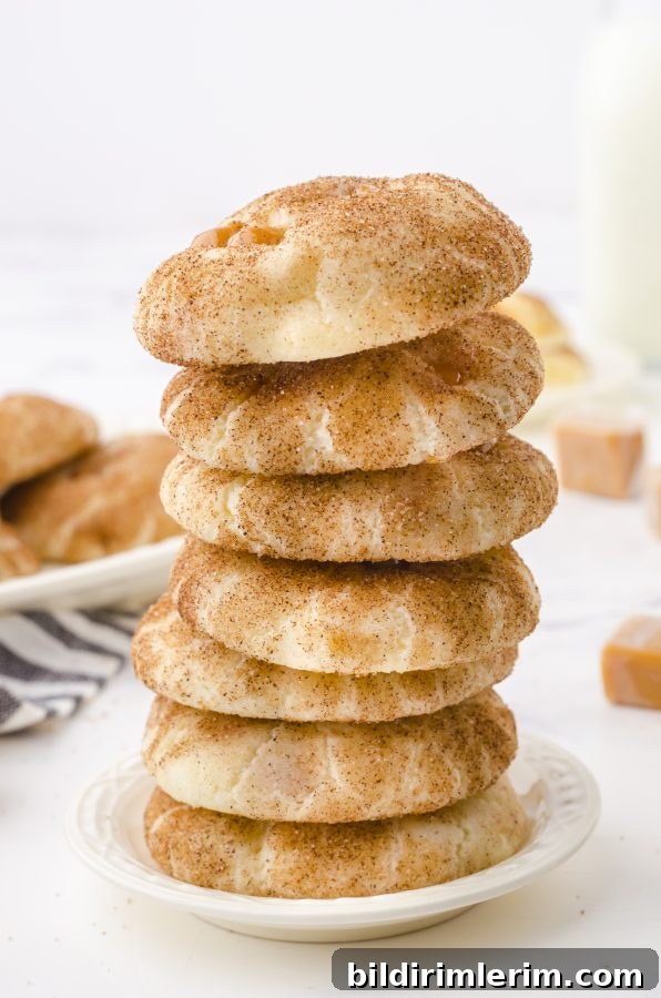 a stack of soft and chewy snickerdoodle caramel bits cookies