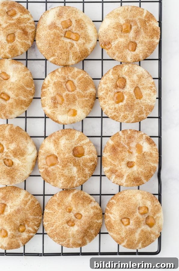 Snickerdoodle caramel bits cookies cooling on a cooling rack