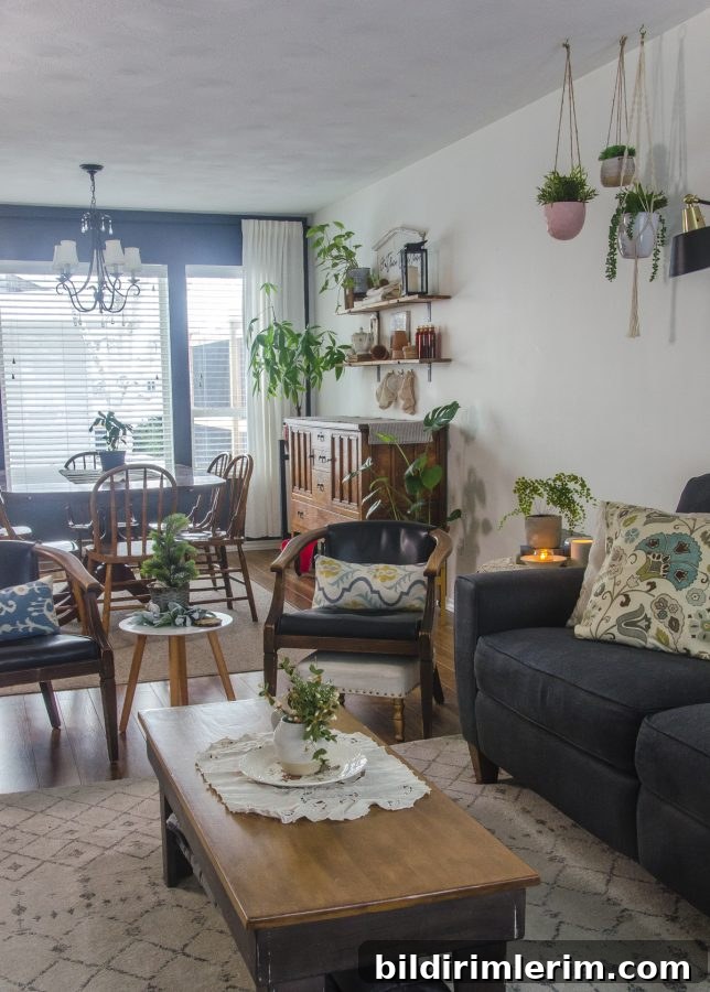 Cottagecore Winter Room Ideas for Warm, Inviting Spaces 5 A cottagecore living room and dining room decorated with vintage items.
