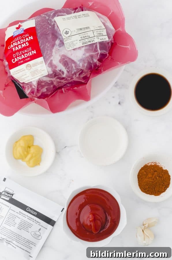 Crock Pot Pulled Pork Recipe: Tender, Juicy BBQ Flavor 3 Ingredients for pulled pork crock pot recipe sitting on a marble counter.