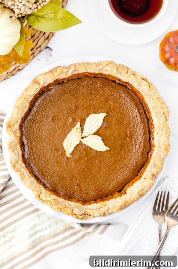 Decorative pastry leaves on pumpkin pie