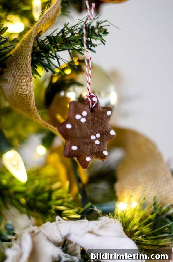 Christmas tree with dried orange slices and gingerbread ornaments