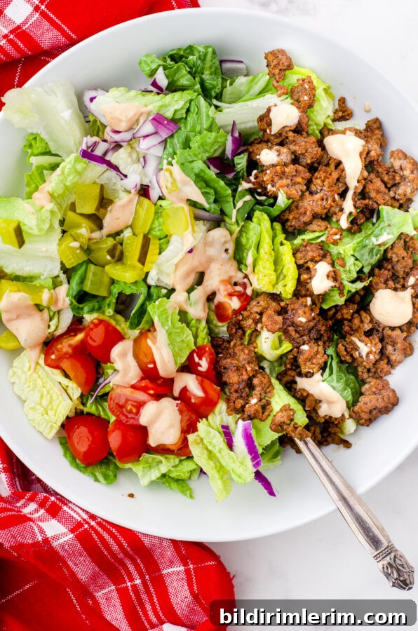 Big Mac Salad Recipe: Copycat Burger Bowl with Special Sauce 2 a healthy big mac salad bowl ready to eat in a big white bowl.