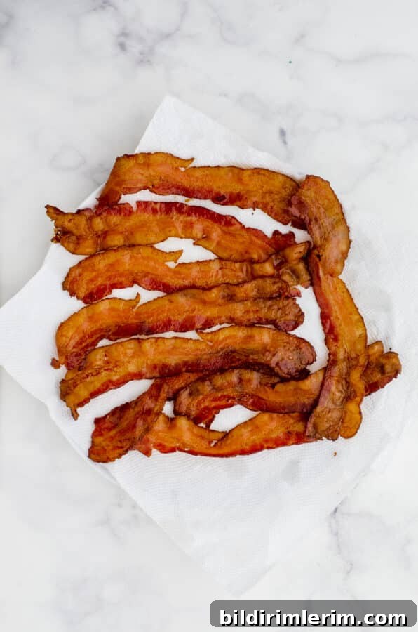 How to Make Crispy Bacon in the Oven Every Time 7 Transfer bacon to a paper towel lined platter.