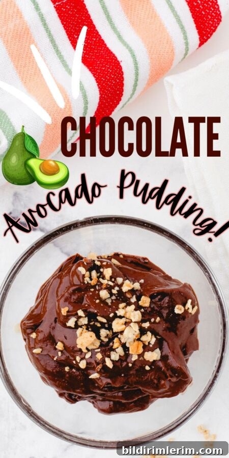 chocolate avocado pudding in a jar, ready to be pinned